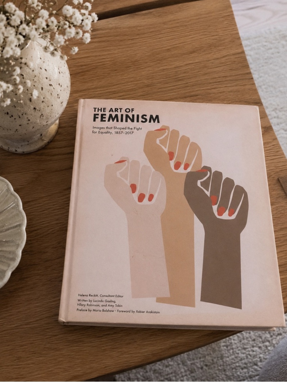 The Art of Feminism Hardcover Book - Blush Cover with Multicolor Graphic